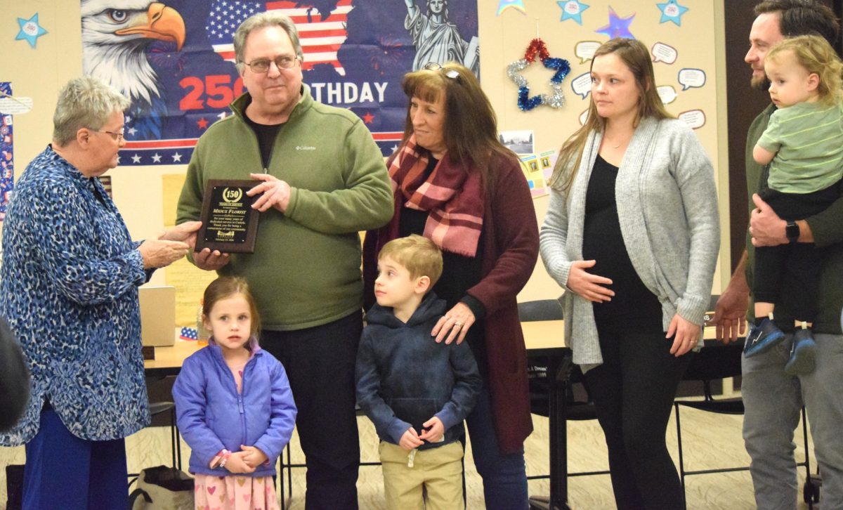 Carlyle City Council presents plaque to Mioux Florist and Greenhouse